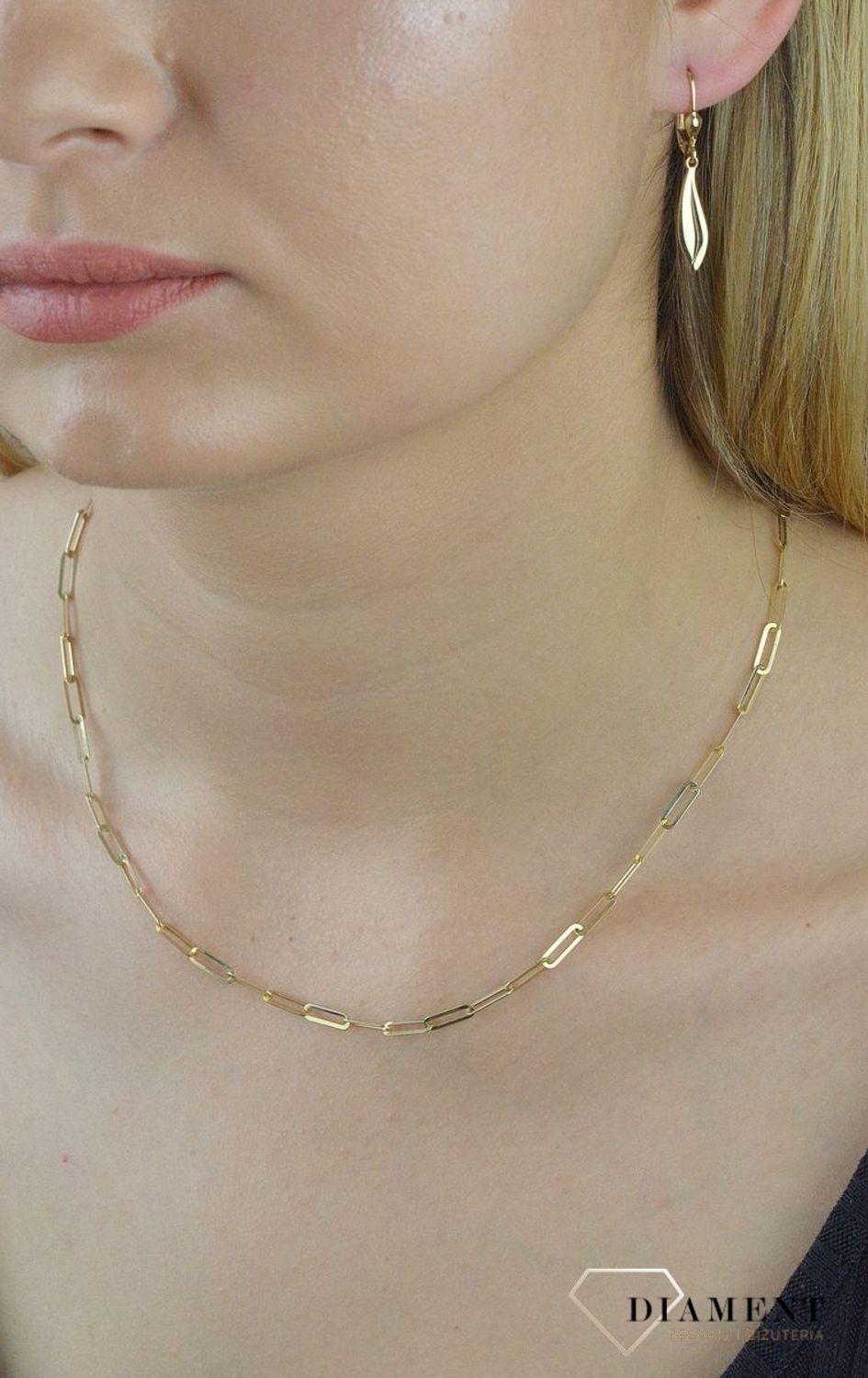 Złote kolczyki wiszące 585 łezki KL 11214. Złote kolczyki wiszące. Złote kolczyki łezki. Eleganckie, złote kolczyki z ozdobnym wiszącym elementem w kształcie koła. Kółko jest do połowy pełne..jpg